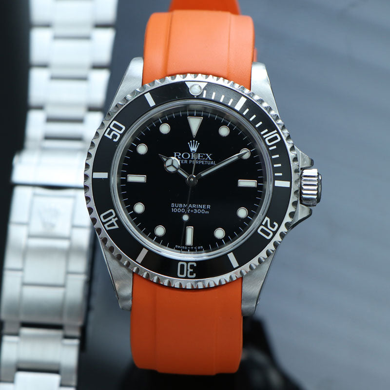 Orange Rubber strap on Rolex Submariner