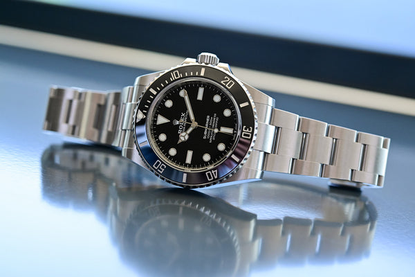 Ahead By A Millimeter: Comparing the New 2020 Rolex Submariner Ref. 124060  to the 114060