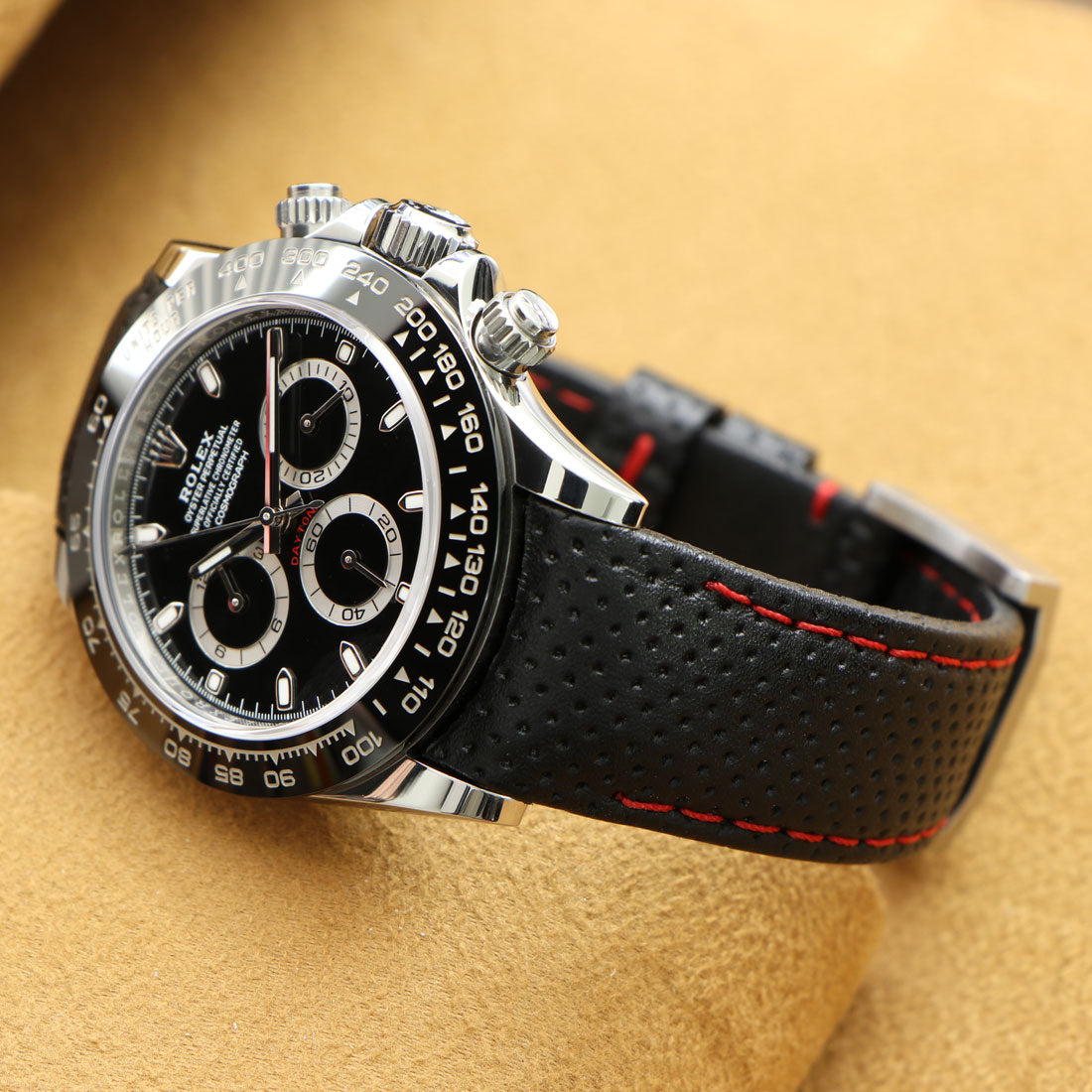 Perforated curved end Leather strap (black with red stitching) on Rolex Daytona